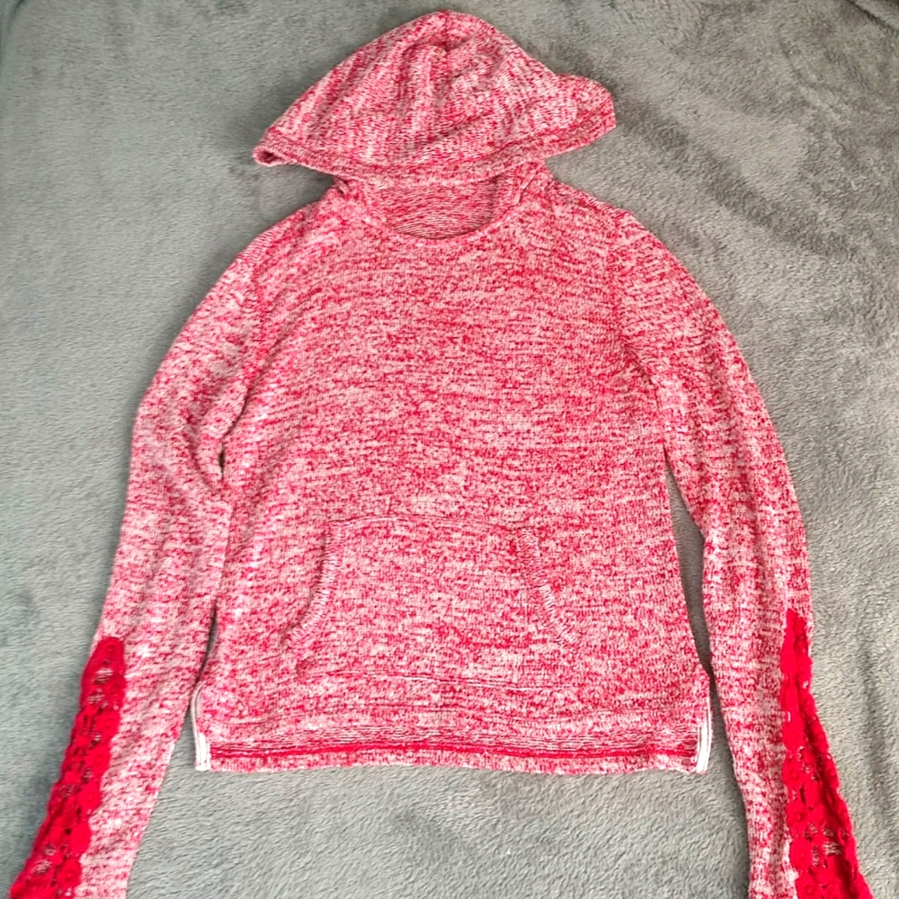 Long sleeve pink shirt with detailing on sleeves